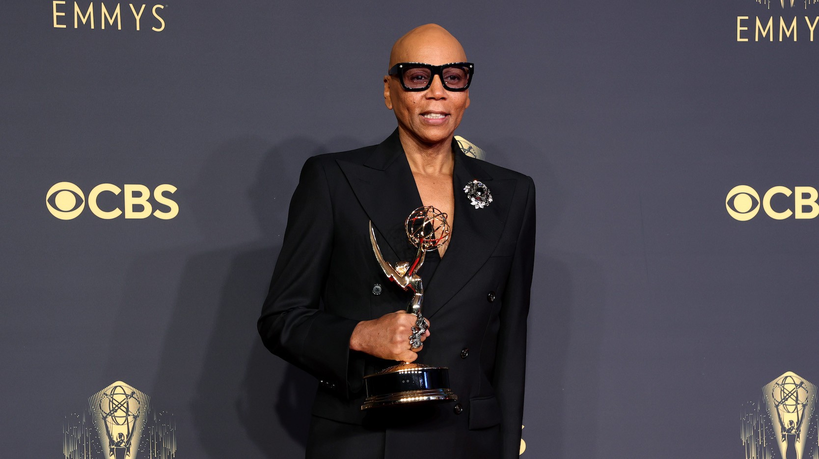 RuPaul holding Emmy award